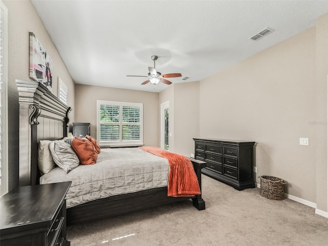 carpeted bedroom with ceiling fan