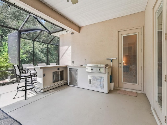 view of patio / terrace with exterior kitchen and exterior bar