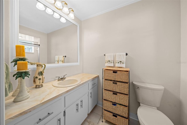 half bath featuring crown molding, tile patterned flooring, toilet, and vanity