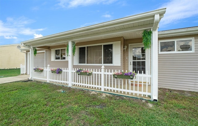 exterior space with a front yard and a garage