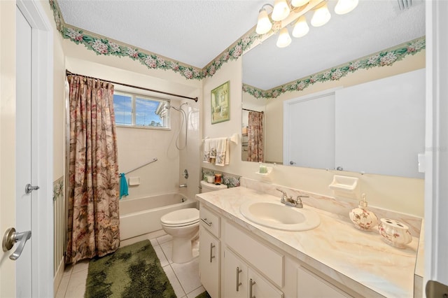 bathroom featuring vanity, tile patterned flooring, toilet, a textured ceiling, and shower / bath combo