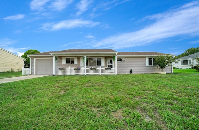 single story home with covered porch, a front yard, and a garage