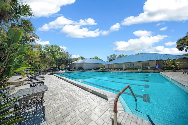 10820 SW 87th Ter, Ocala, FL 34481 - community pool with a patio