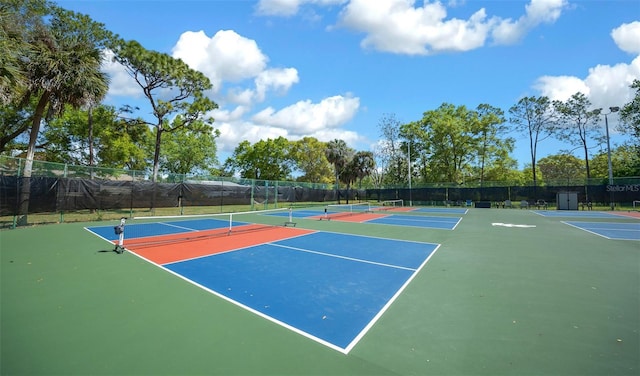 10820 SW 87th Ter, Ocala, FL 34481 - view of tennis court with community basketball court and fence