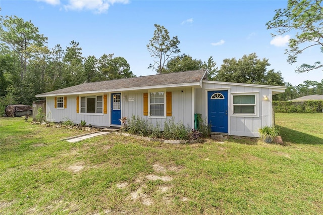 ranch-style house with a front yard