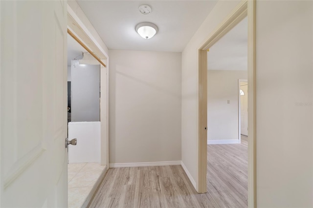 hallway featuring light hardwood / wood-style floors