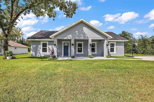 view of front facade featuring a front yard and a porch