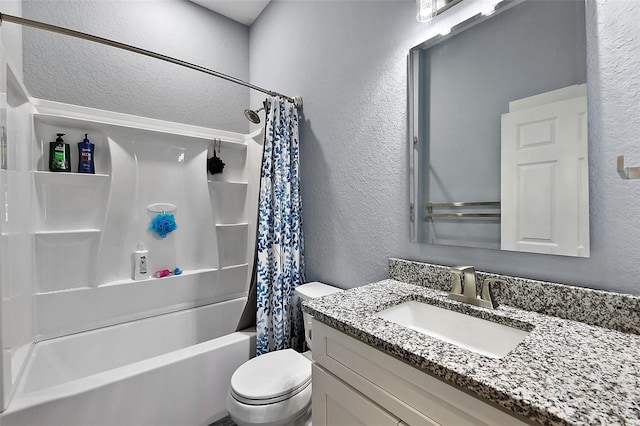 full bathroom featuring shower / bath combo with shower curtain, vanity, and toilet