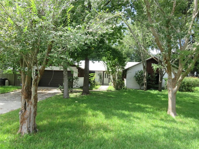 view of yard with a garage