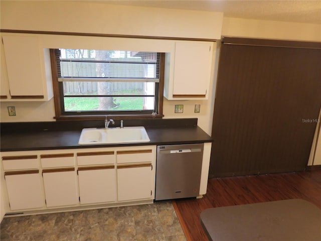 kitchen with dishwasher, a textured ceiling, sink, white cabinetry, and dark hardwood / wood-style flooring