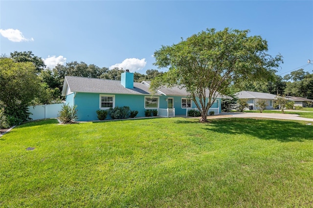 ranch-style house with a front yard