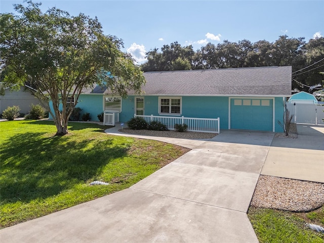 6212 NE 26th Ave, Ocala, FL 34479 - single story home with driveway, an attached garage, and covered porch