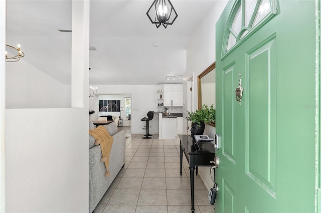 6212 NE 26th Ave, Ocala, FL 34479 - entryway with a chandelier and light tile patterned floors