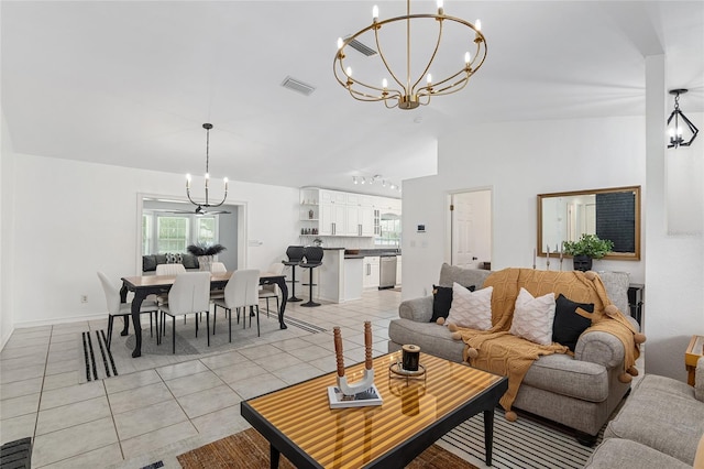 6212 NE 26th Ave, Ocala, FL 34479 - living area featuring a chandelier, vaulted ceiling, and light tile patterned floors
