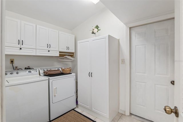 6212 NE 26th Ave, Ocala, FL 34479 - laundry room featuring cabinet space, washer and clothes dryer, and light tile patterned floors
