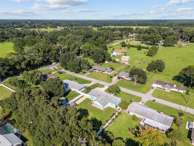 6212 NE 26th Ave, Ocala, FL 34479 - aerial view of property and surrounding area with a forest