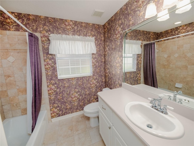 full bathroom with vanity, toilet, shower / bathtub combination with curtain, and tile patterned floors