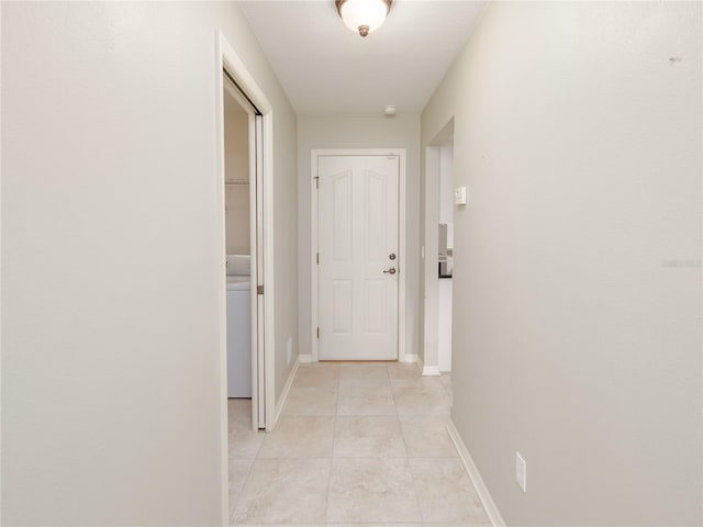 corridor featuring light tile patterned flooring