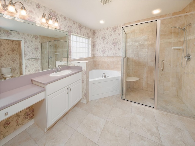 bathroom with vanity, plus walk in shower, and tile patterned floors