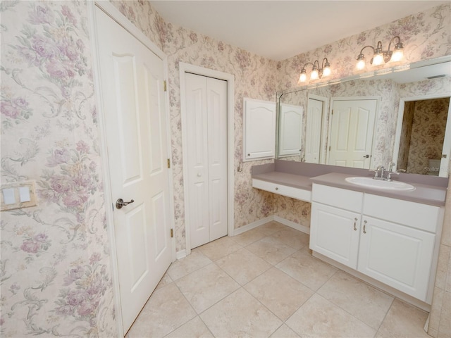 bathroom with vanity and tile patterned floors