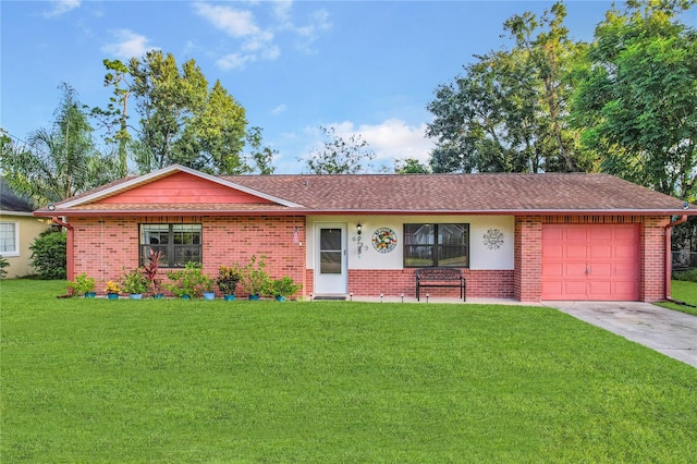 ranch-style house featuring an attached garage, concrete driveway, a front yard, brick siding, and roof with shingles