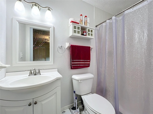 bathroom featuring a textured ceiling, toilet, a shower with shower curtain, and vanity