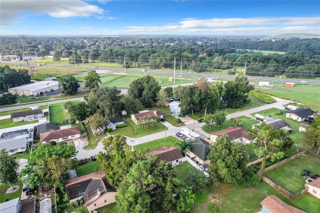 drone / aerial view featuring a forest view