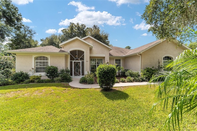 ranch-style house with a front yard