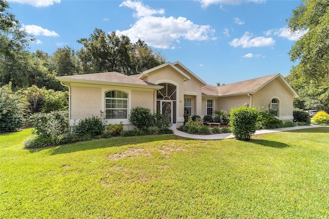 view of front of home with a front yard