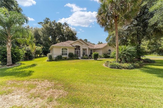 view of front of home with a front lawn