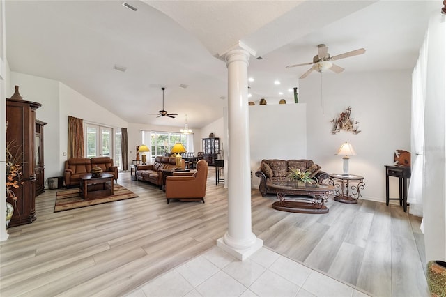 living room with lofted ceiling, light hardwood / wood-style floors, ceiling fan, and ornate columns