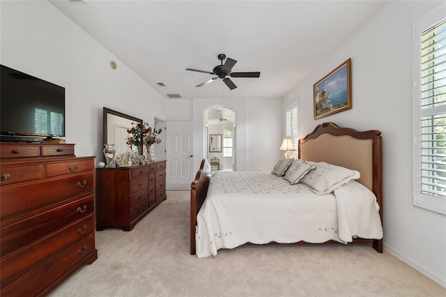 bedroom featuring ceiling fan and light colored carpet