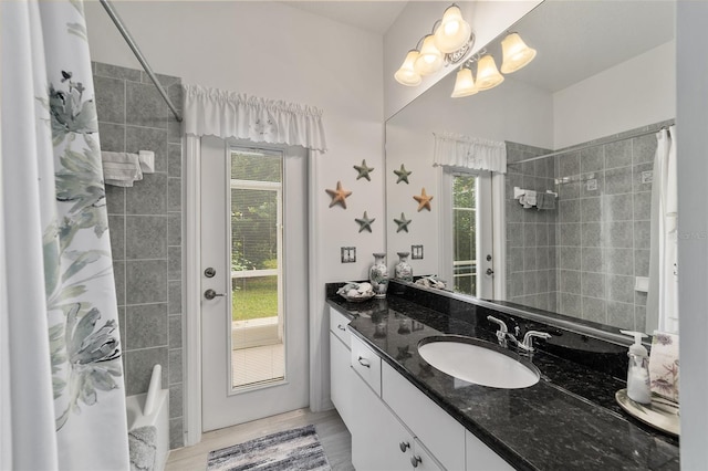 bathroom featuring wood-type flooring and vanity