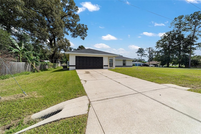 single story home with a garage and a front yard