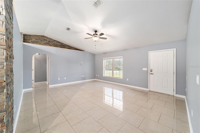 tiled spare room with ceiling fan and lofted ceiling