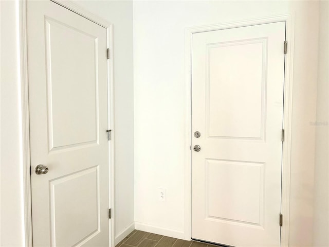 interior space with dark wood-type flooring