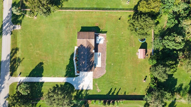 birds eye view of property featuring a rural view