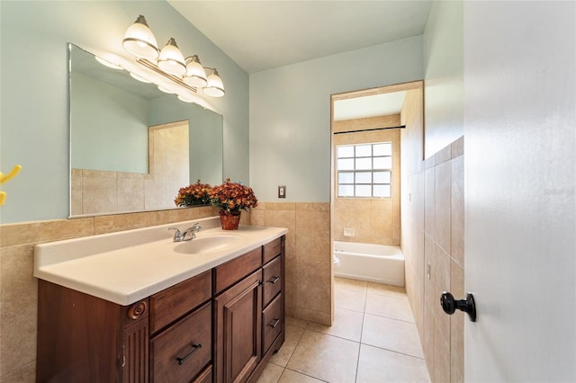 bathroom with vanity, tile walls, and tile patterned flooring