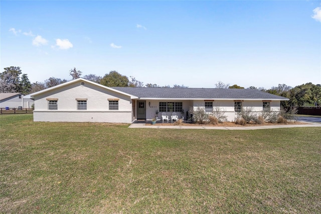 single story home with a front yard