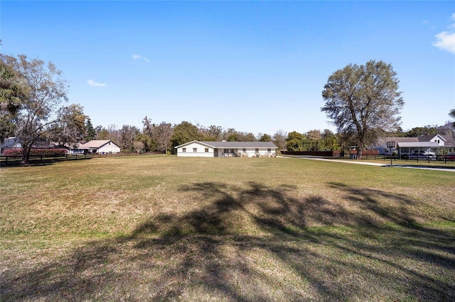 view of yard featuring fence