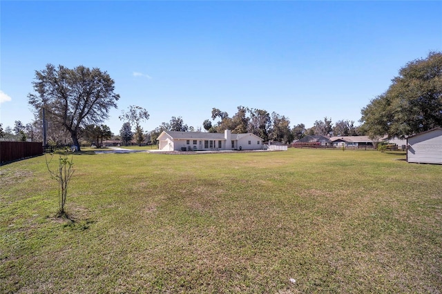 view of yard with fence