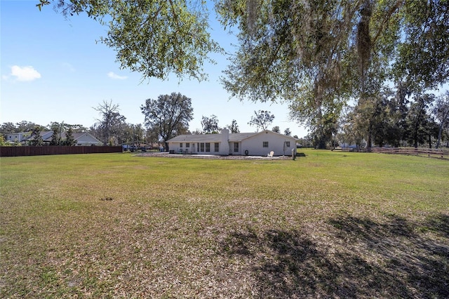 view of yard with fence