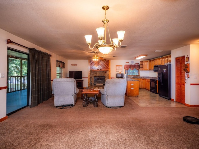 24750 NE 177th Ter, Fort Mc Coy, FL 32134 - living area featuring a chandelier, light carpet, a textured ceiling, and a fireplace