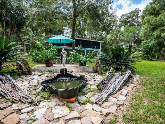 24750 NE 177th Ter, Fort Mc Coy, FL 32134 - view of green lawn featuring a sunroom