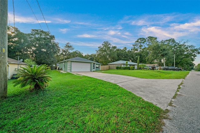 single story home featuring a front lawn