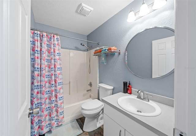 full bathroom featuring vanity, toilet, a textured ceiling, and shower / tub combo with curtain