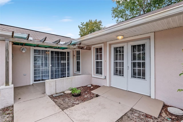 doorway to property featuring a patio