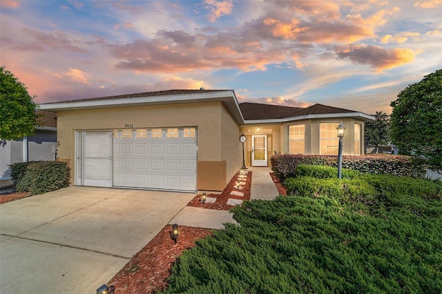 view of front of property with a garage