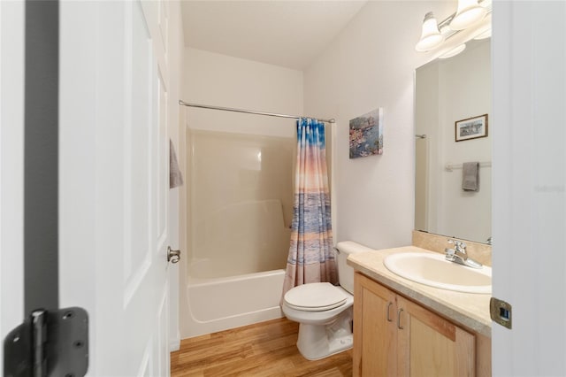 full bathroom with wood-type flooring, vanity, toilet, and shower / tub combo with curtain