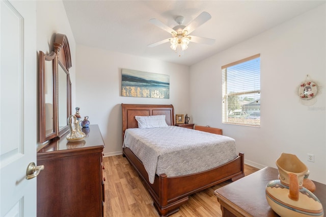 bedroom featuring ceiling fan and light hardwood / wood-style flooring